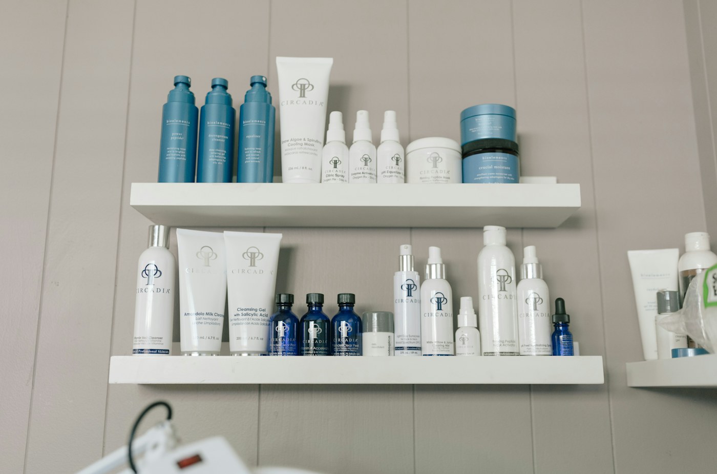 Skincare products arranged on pharmacy shelves